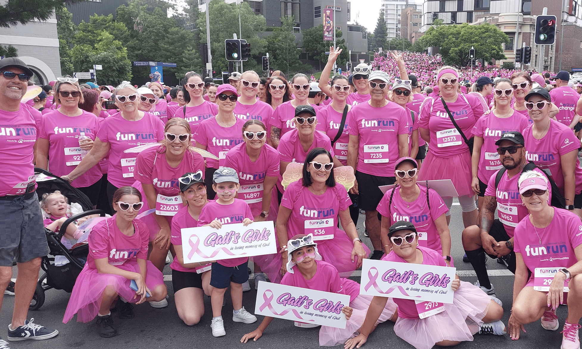 Staff walk together to support women with breast cancer